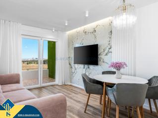 Piso en Punta Prima. Apartamento renovado con piscina comunitaria, en la provincia de