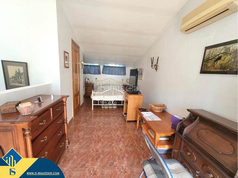 Foto d6c245a9-5b8d-4cd5-a86f-f629355f0f01. Casa a schiera con camino riscaldamento parcheggio piscina in Orihuela
