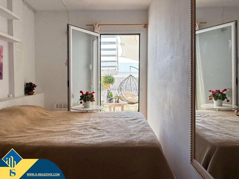 Foto a2629dfb-525c-496c-bc33-c9f73257f132. Duplex avec parking dans Puig des Molins Ibiza