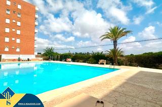 Pis a Punta Prima. Apartamento con piscina comunitaria, en la provincia de alicante