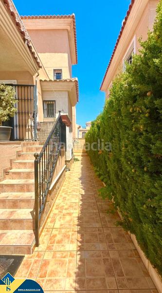 Foto 35b23259-496c-4702-bba6-3545d58f6e70. Casa adossada amb xemeneia calefacció aparcament piscina a Orihuela