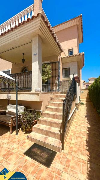 Foto 4f9042fd-c3e6-4d18-a40a-86d8344c7343. Casa adossada amb xemeneia calefacció aparcament piscina a Orihuela