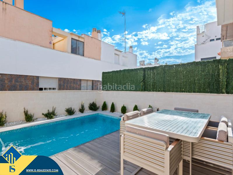 Foto 7e1b034b-3e56-4c9e-a870-77bea955c775. Chalet avec parking piscine dans Los Secanos Guardamar del Segura