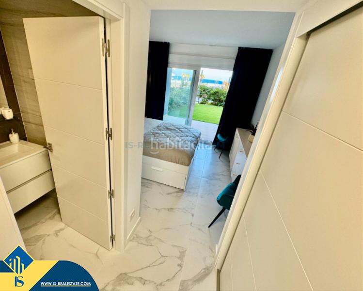 Foto 8d890fb5-cd22-4a1f-8ef0-e4d2d4e0870e. Flat with pool in Punta Prima Torrevieja