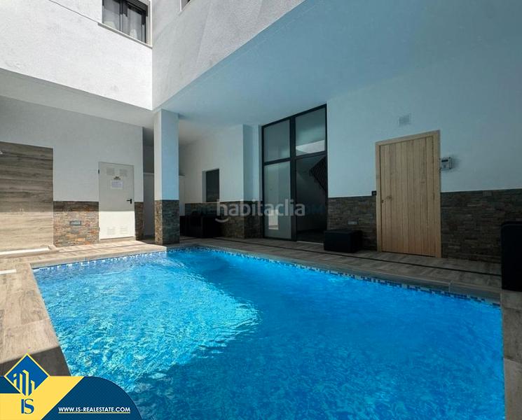 Foto 760c6768-dfd2-42f2-9793-8eccb4e1f7f2. Piccolo appartamento con parcheggio piscina in Las Piscinas Naturales Torrevieja