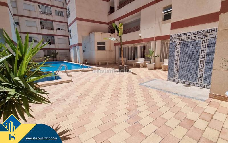 Foto cfbeb2c1-0662-49eb-a704-fc35efccab52. Apartment with heating pool in Parque de las Naciones Torrevieja