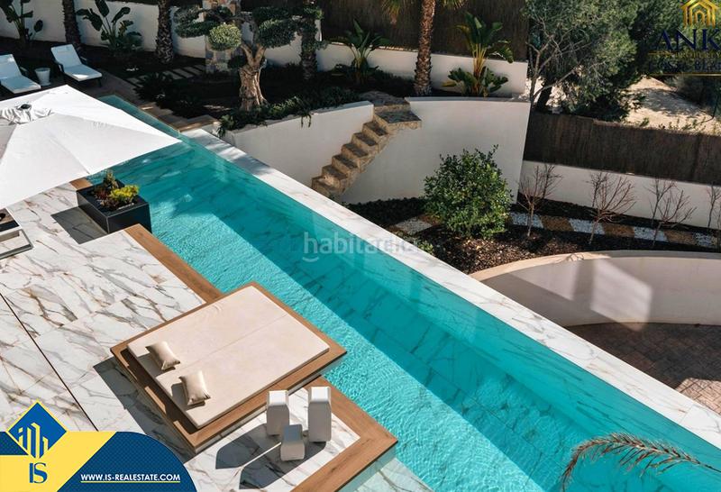 Foto f88688f0-a11f-4569-9221-50fa3933496d. Chalet con parcheggio piscina in Los Almendros Orihuela