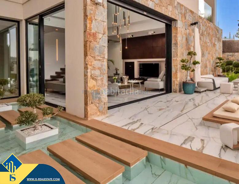 Foto fce094db-139b-4d69-b145-40d1763f2df9. Chalet con parcheggio piscina in Los Almendros Orihuela