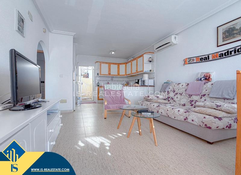 Foto 1c294396-3b9c-4d70-a80f-65b75dbd74ee. Maison avec chauffage parking dans La Florida Orihuela