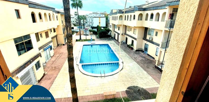 Foto 2a3d592e-bd67-41a9-b84b-428b2256593c. Apartament amb calefacció aparcament piscina a Punta Prima Torrevieja