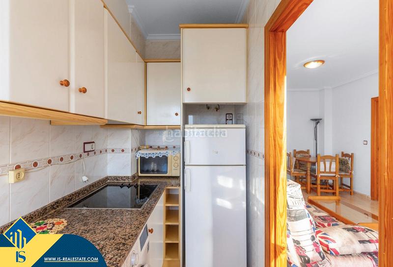 Foto 828c2e3a-afc7-48f6-baa1-cb8186f892bc. Apartamento  con piscina comunitaria, en la provincia de alicante, en la ciudad . 2 habitaciones | 59 m² | 1 kilómetro en Torrevieja