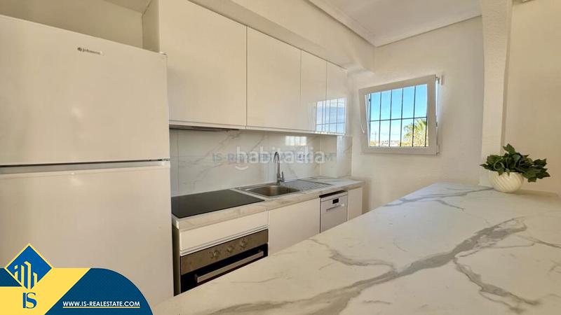 Foto e15a1644-804c-45dc-ab5c-aba1ecce9094. Attico con parcheggio in Punta Prima Torrevieja