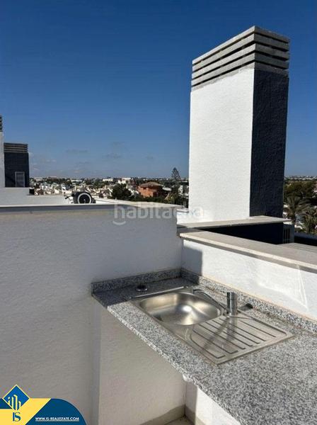 Foto 52f0388f-f357-4015-9588-cdcdf8516a52. Dachwohnung mit heizung parking pool in Playa Flamenca Orihuela