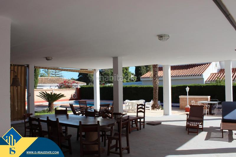 Foto 358378a8-cad5-4e6d-99c4-5a1c19b3aa64. Chalet con parcheggio piscina in Campoamor Orihuela