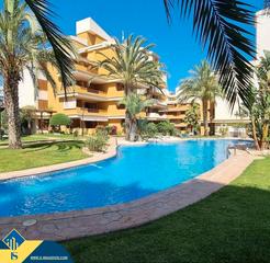 Appartamento in Punta Prima. Apartamento con piscina comunitaria, en la provincia de alicante