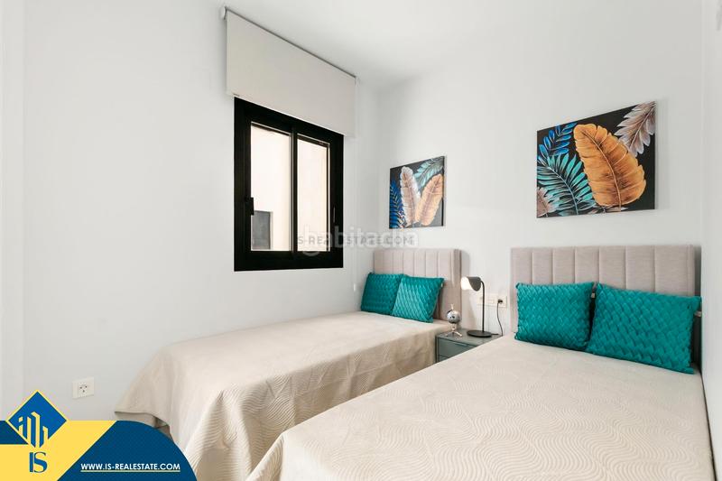 Foto 0045c3e7-f21b-4c9e-866e-a601addf6211. Etagenwohnung mit pool in Punta Prima Orihuela