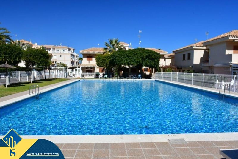 Foto cd12df54-7665-4fcc-ab5c-f59f3f12c884. Casa amb aparcament piscina a Playa Flamenca Orihuela