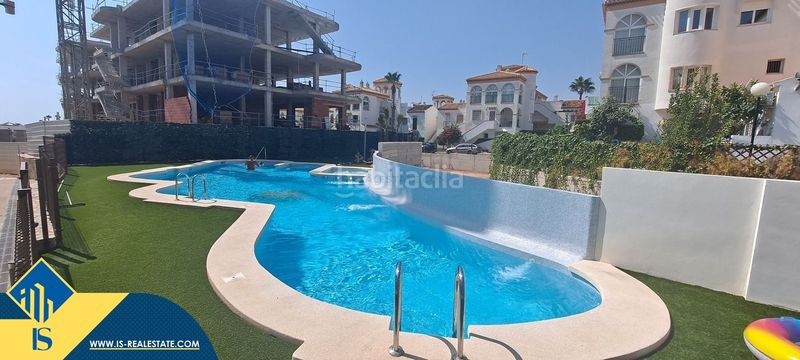 Foto 097d85ba-2b34-4ca0-83d0-37800f37112f. Pis amb aparcament piscina a La Zenia Orihuela