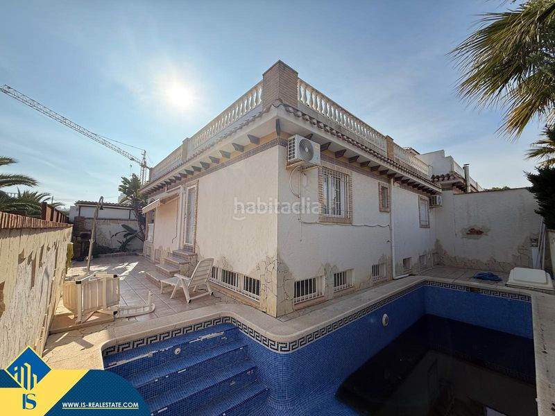Foto 4cb2abca-54fa-4fbc-b153-0e204761e296. Casa amb aparcament piscina a Campoamor Orihuela