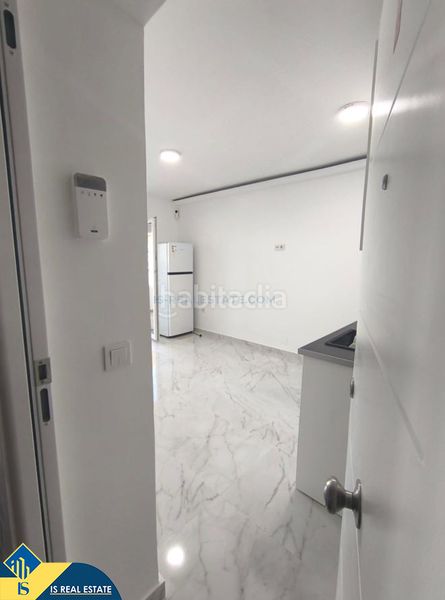 Foto 6067128e-9939-43ed-b889-0468b67bac37. Estudi amb calefacció piscina a Rojales hills - rosa bungalows Rojales