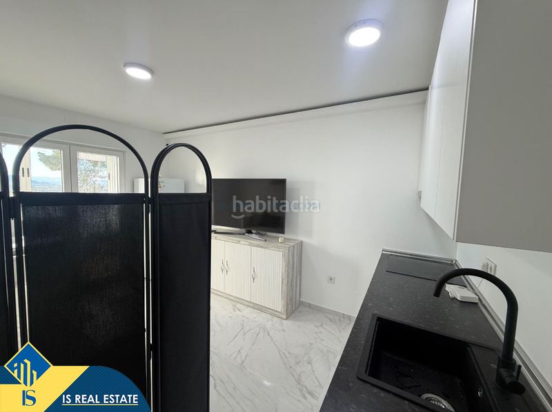 Foto ad099474-71ba-4ecd-a22b-46fdc143288d. Estudi amb calefacció piscina a Rojales hills - rosa bungalows Rojales