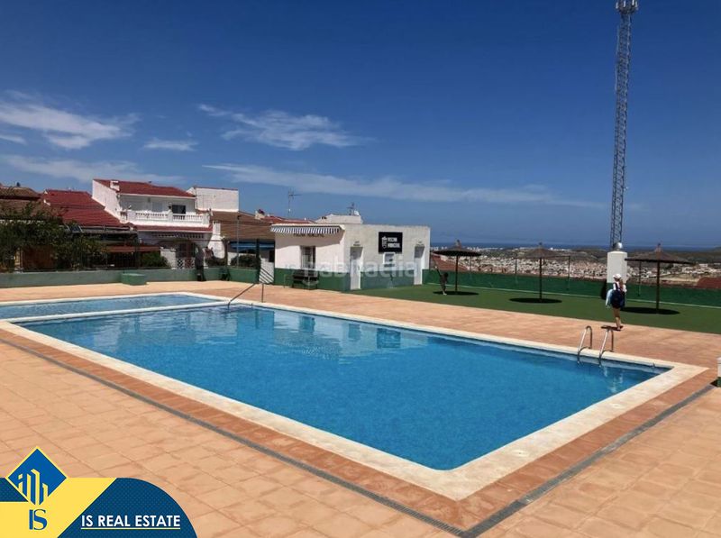 Foto eb0aa8f2-56da-4114-9b0c-9de712c8f143. Estudi amb calefacció piscina a Rojales hills - rosa bungalows Rojales