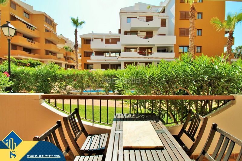 Foto 00ce8b92-35a5-40c9-96a0-3bdcda58fa9f. Pis amb aparcament piscina a Punta Prima Torrevieja