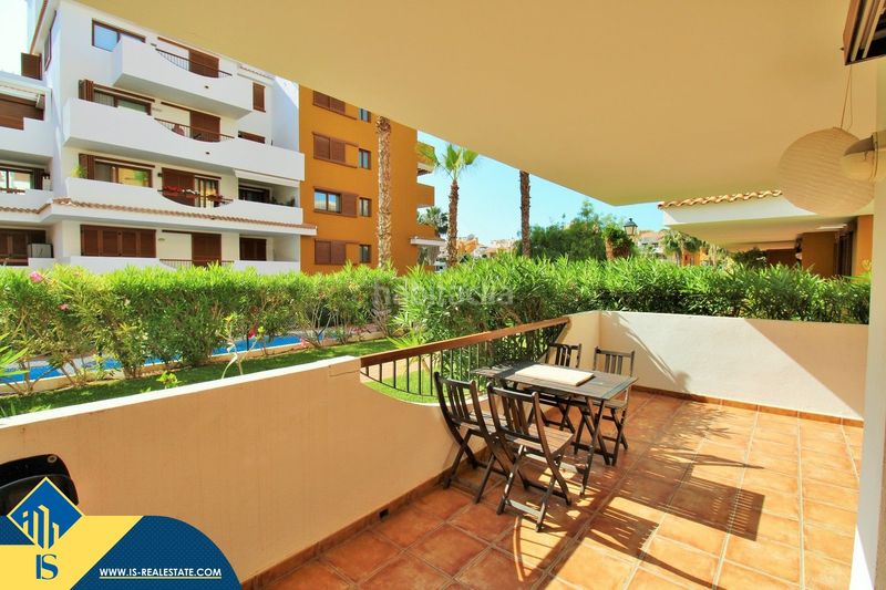 Foto 84daa4ec-0b6c-40a1-86b2-0a75dd4c7733. Pis amb aparcament piscina a Punta Prima Torrevieja