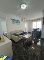 Apartament a Las Piscinas Naturales. Apartamento reformado con terraza, en la provincia de alicante,