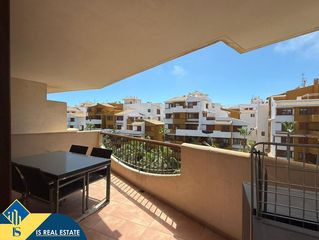 Apartament a Punta Prima. Apartamento con piscina comunitaria en la provincia de alicante,