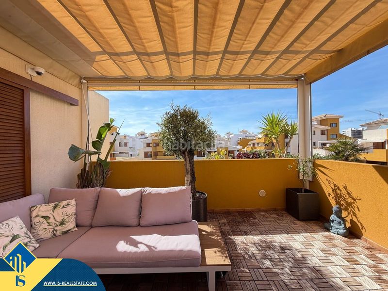 Foto 11ad6bc5-8c72-46f6-b16f-5e7301884655. Àtic amb aparcament piscina a Punta Prima Torrevieja