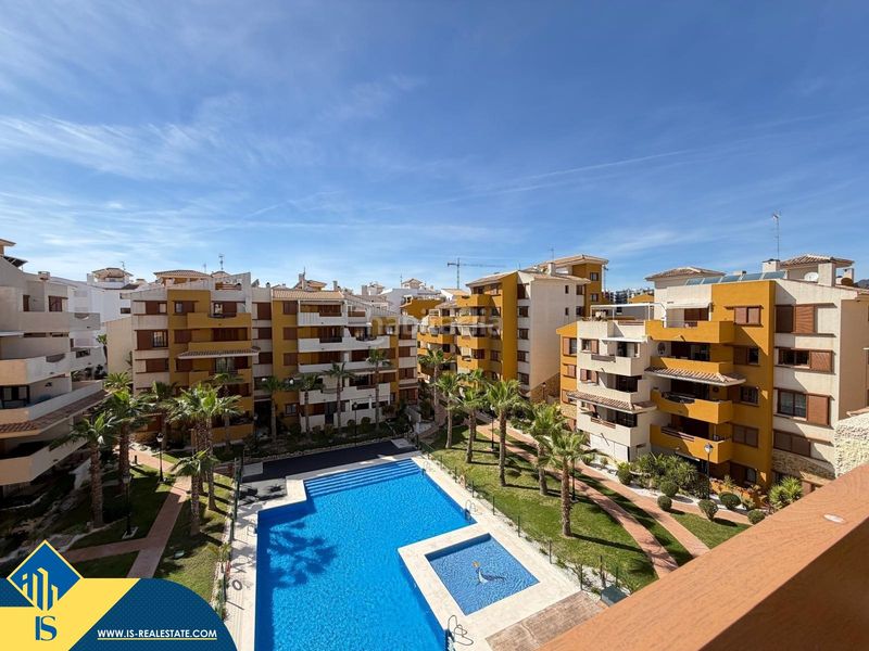 Foto 1660c09e-0f56-4f82-a405-dfaeeb381762. Àtic amb aparcament piscina a Punta Prima Torrevieja