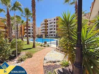Apartament a Punta Prima. Apartamento con piscina comunitaria en la provincia de alicante,