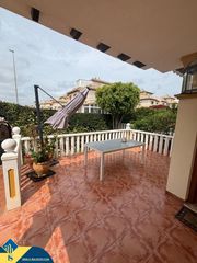 Casa a Lomas de Cabo Roig - Los Dolses. Bungalow con piscina comunitaria, en la provincia de alicante, e