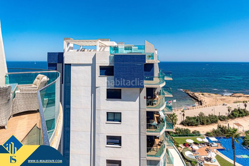 Foto d6ad0194-6d83-4c3a-a987-fb16cb15de9d. Àtic amb aparcament piscina a Punta Prima Torrevieja