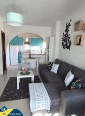Piccolo appartamento in Las Piscinas Naturales. Apartamento con piscina comunitaria, en la provincia de alicante