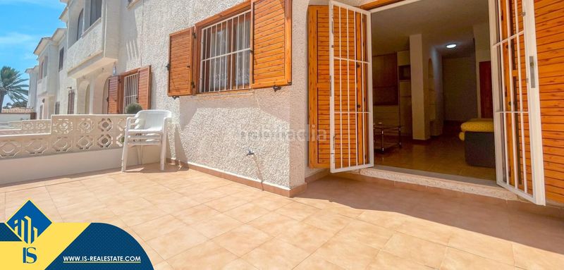 Foto 2a0ff9c4-8351-406e-a3d8-51dc2af6b62d. Casa amb aparcament a Playa Flamenca Orihuela