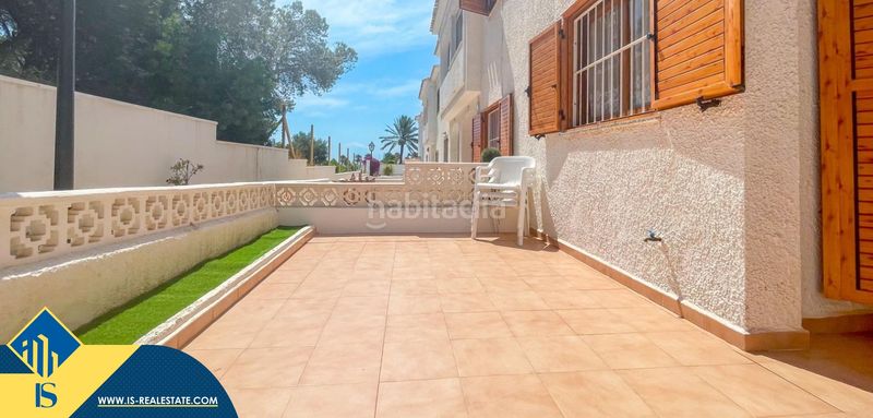 Foto c4b9513b-fc75-49ce-b289-2f8039712701. Casa amb aparcament a Playa Flamenca Orihuela