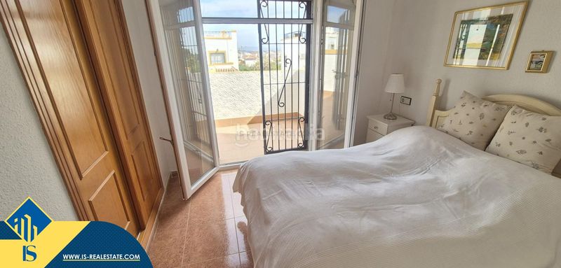 Foto c08b4136-80ba-429b-8c87-6a5ac46eb604. Casa amb piscina a Los Balcones y los Altos Orihuela