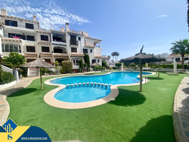 Foto 6bfe7cba-a71c-4faf-9d9c-d6ff035f70d6. Pis amb piscina a Cabo Roig Orihuela