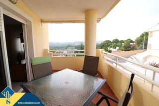Location Appartement à Campoamor. Apartamento con piscina comunitaria, en la provincia de alicante