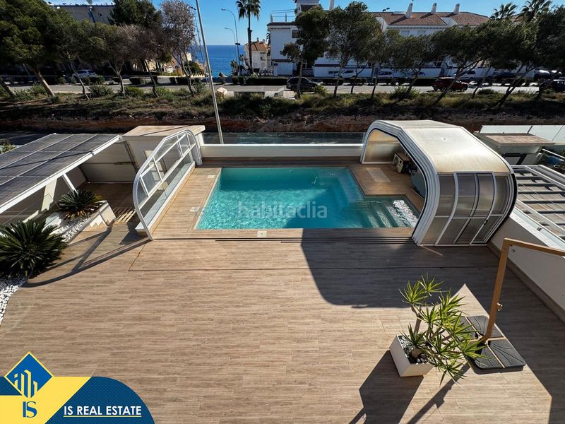 Foto 0cdbcc5e-1708-4e82-bd60-510f8359ac3c. Xalet amb xemeneia calefacció piscina a Campoamor Orihuela