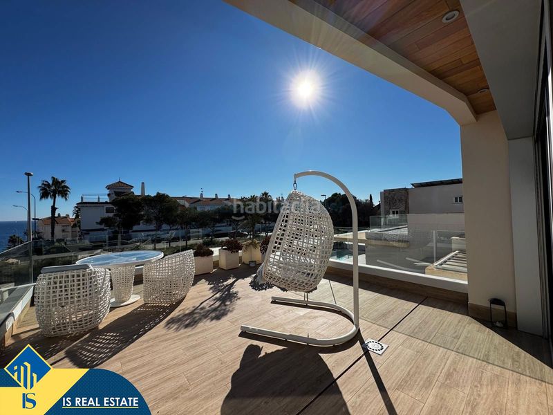 Foto de164759-210e-45a7-8852-fc983727939c. Xalet amb xemeneia calefacció piscina a Campoamor Orihuela