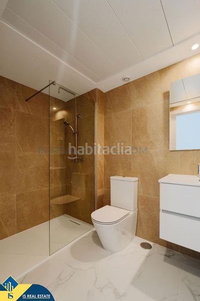 Foto 4e2d44fc-cf51-4a94-b2a1-fe236c8f5a8d. Apartment with heating pool in Punta Prima Orihuela