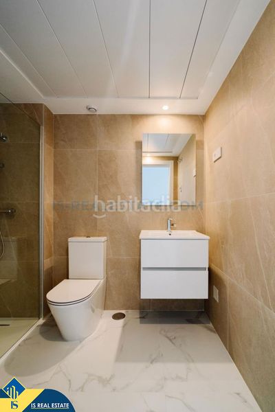 Foto c58b0859-6e5d-433c-b46b-76fb16ca490a. Apartment with heating pool in Punta Prima Orihuela