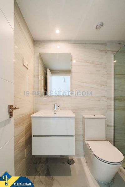 Foto f5fd8aa2-53b5-45cf-95d3-3edc79a8d4b5. Apartment with heating pool in Punta Prima Orihuela