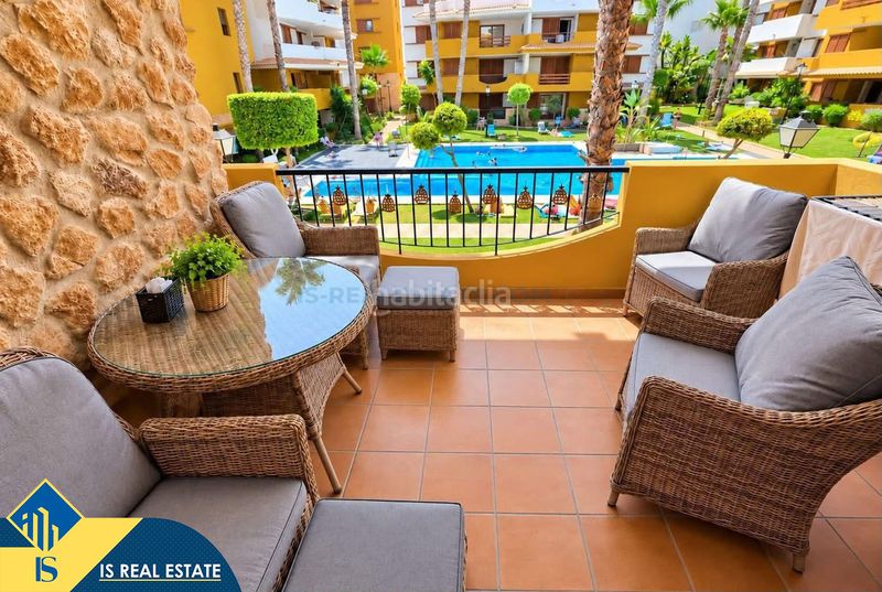 Foto 23733fd7-b539-458d-9331-804a65291724. Appartement mit heizung parking pool in Punta Prima Torrevieja