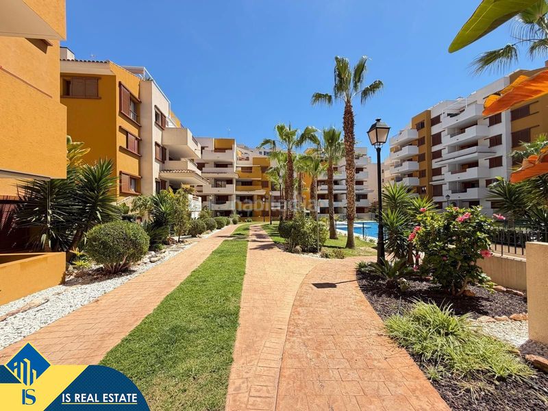 Foto 4af0cddc-7b7f-47eb-9255-8b8cfd59444e. Appartement mit heizung parking pool in Punta Prima Torrevieja