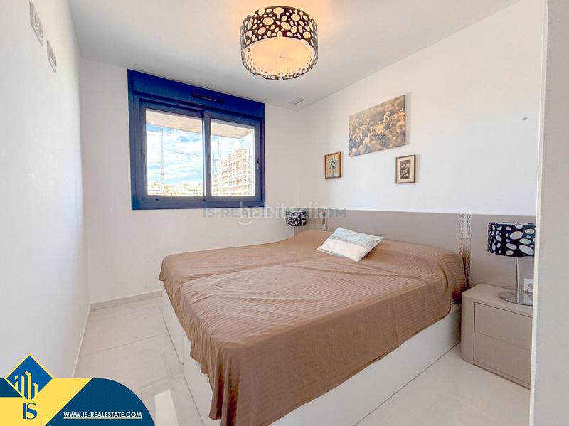 Foto 0e2b1c8c-3e9b-4d33-aee3-f4c82c95022b. Appartement avec piscine dans Punta Prima Torrevieja