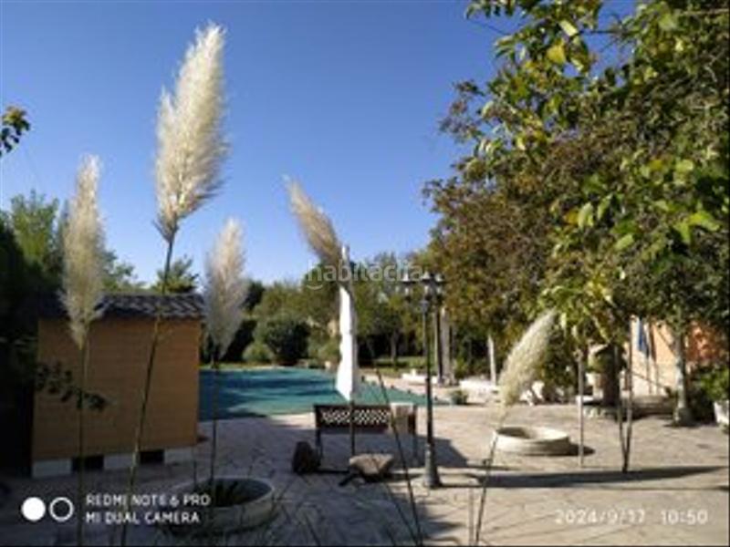 Foto 63bef5a4-9a54-46d0-92ba-135a593803c5. Masia amb xemeneia calefacció piscina a Colmenar de Oreja